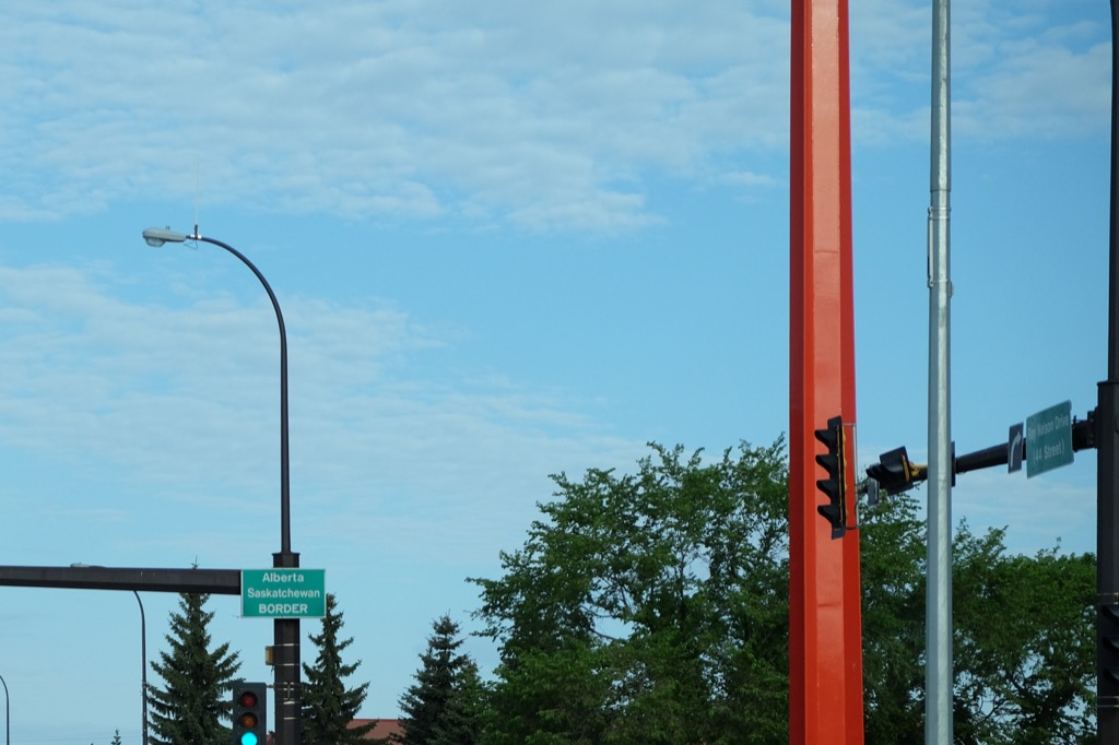 Alberta border in Lloydminster. Denoted by the giant red poles and a tiny sign.